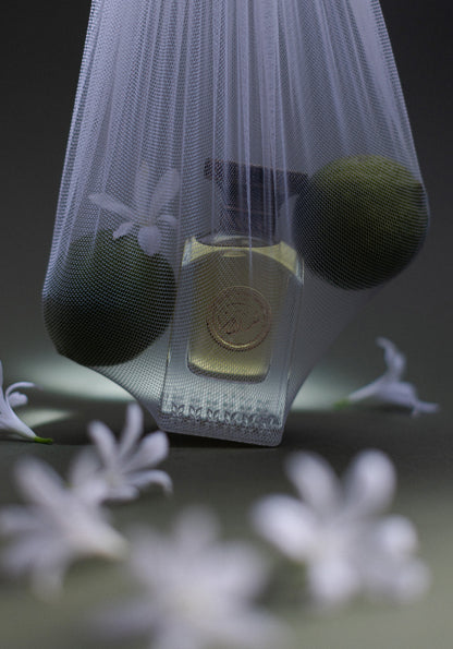 ANFAS SALAM — flacone con agrumi e fiori bianchi; fotografia ufficiale ANFAS
