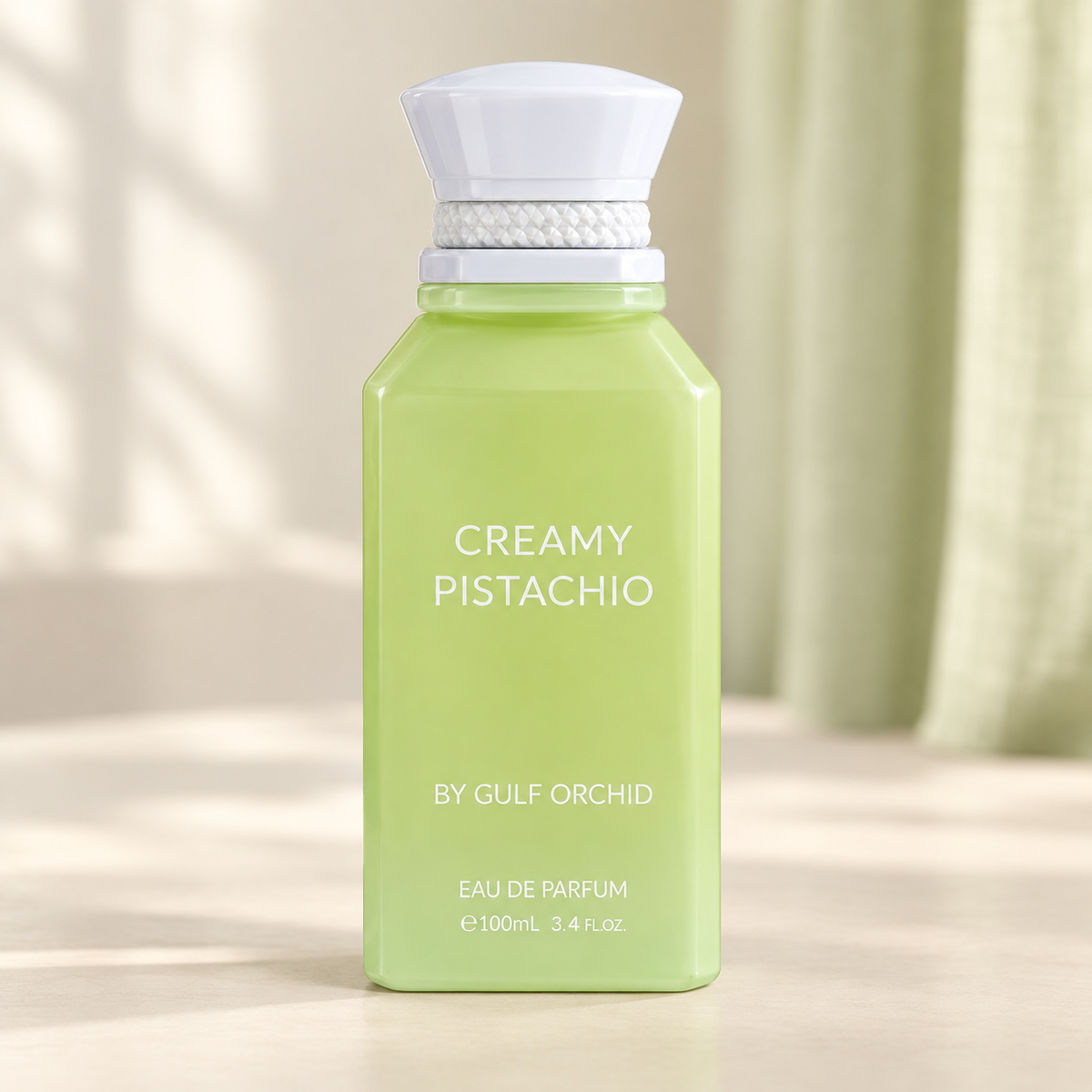 GULF ORCHID - CREAMY PISTACHIO, flacone frontale centrale ravvicinato con sfondo leggero