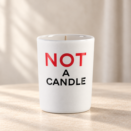 NOT A CANDLE di Juliette Has a Gun — prodotto su fondo beige, ambientazione creata con IA