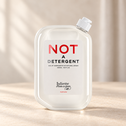 NOT A DETERGENT di Juliette Has a Gun — prodotto su fondo beige, ambientazione creata con IA