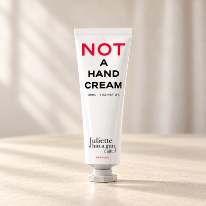 NOT A HAND CREAM di Juliette Has a Gun — prodotto su fondo beige, ambientazione creata con IA